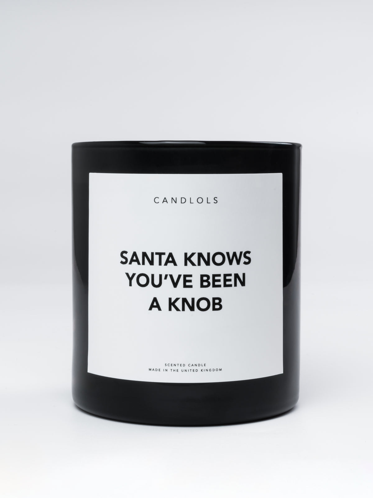 'Santa knows you've been a knob' candle