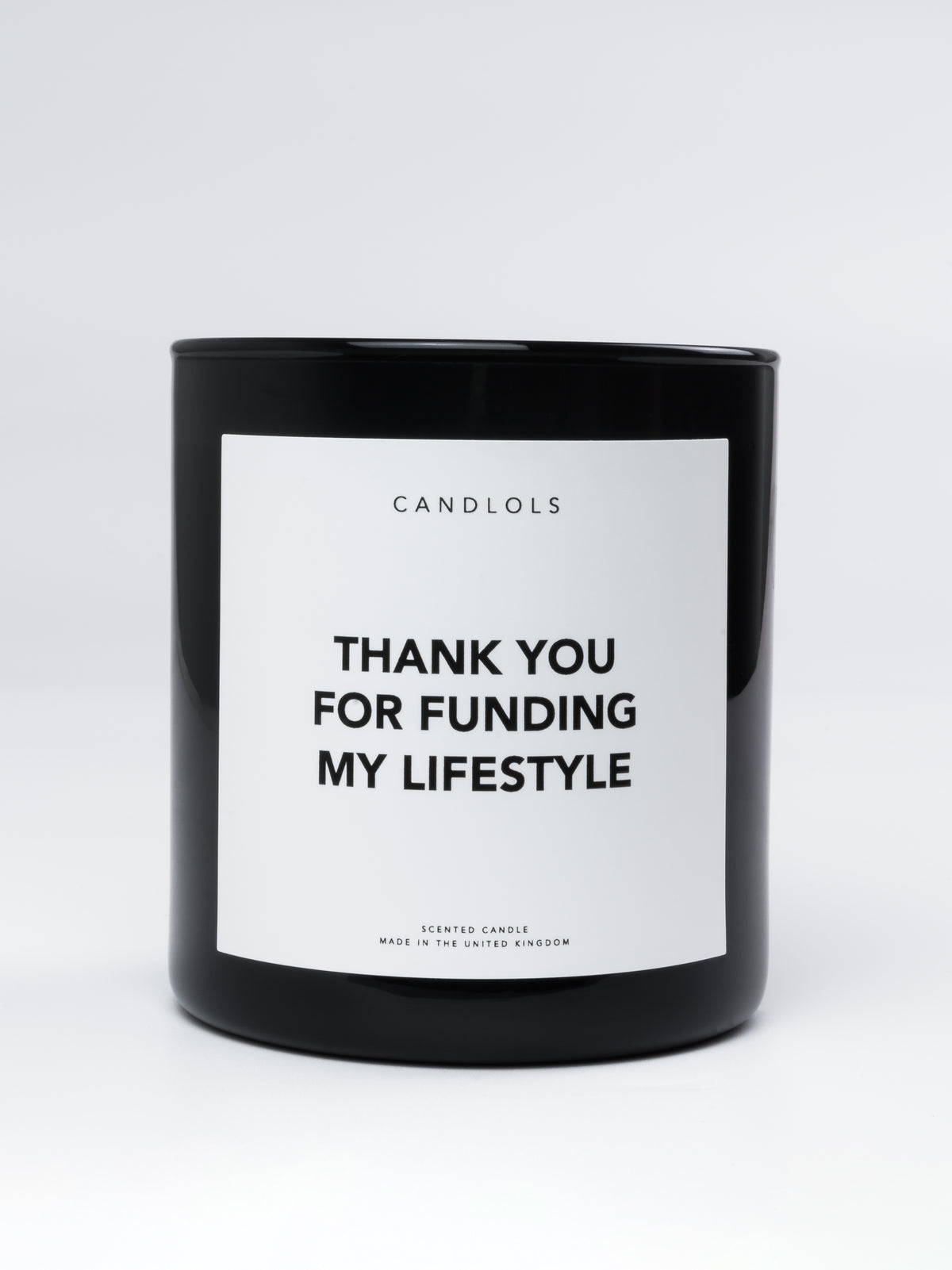 'Thank you for funding my lifestyle' candle